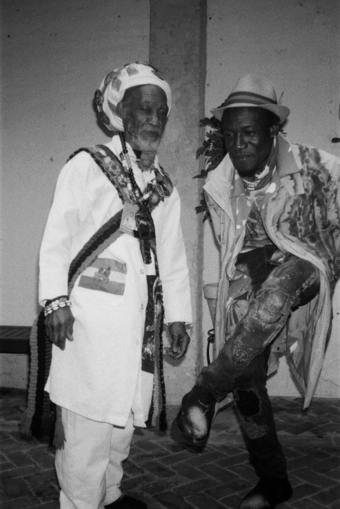Two performers in white, black and white photograph